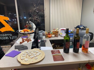 Zuber Realty’s Agents Treat Community to Wine and Snacks