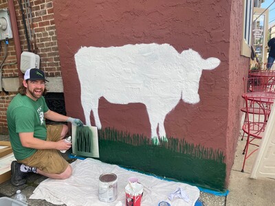 Artist DJ Barry of Vermont Paints World Cow Mural Inspiring Kindness